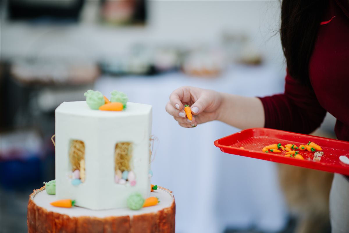 Decorating a custom celebration cake