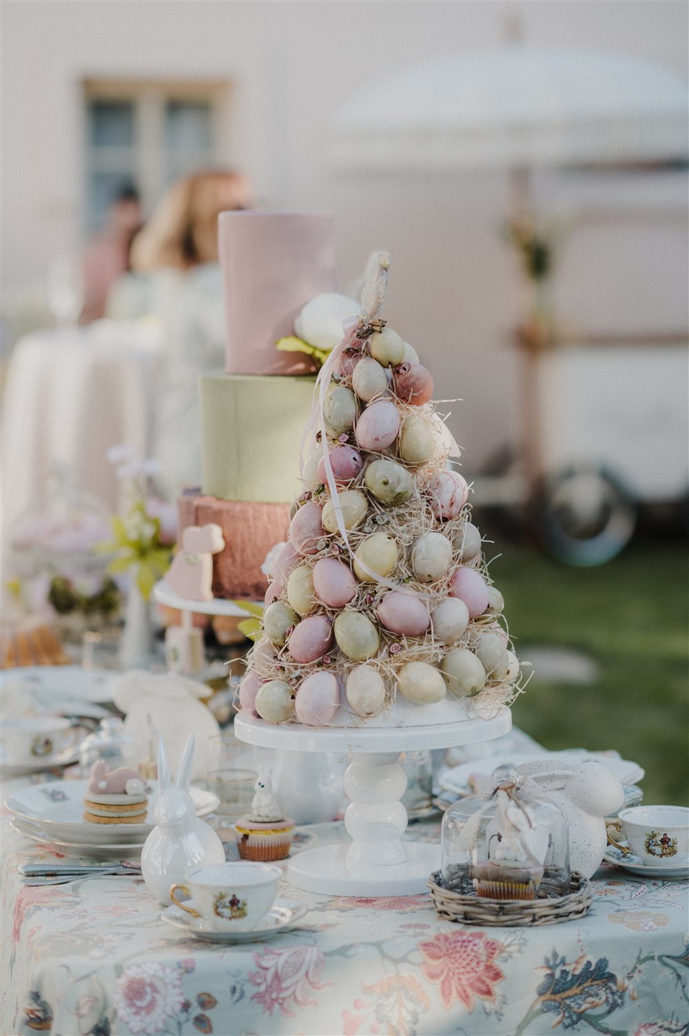 Pastel dessert table with macaron tower
